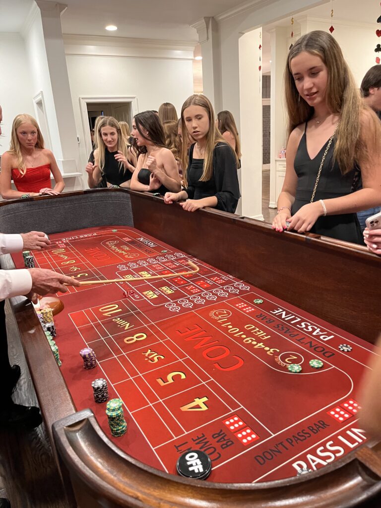 Casino craps table with gorgeous women