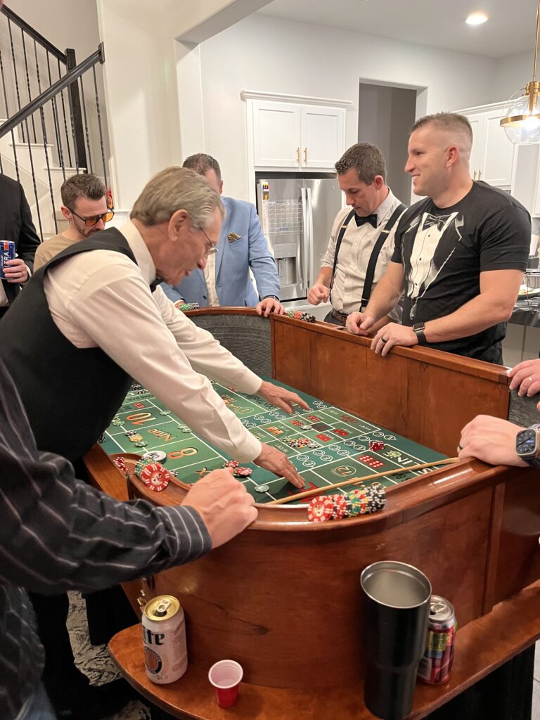 Casino craps table with people playing